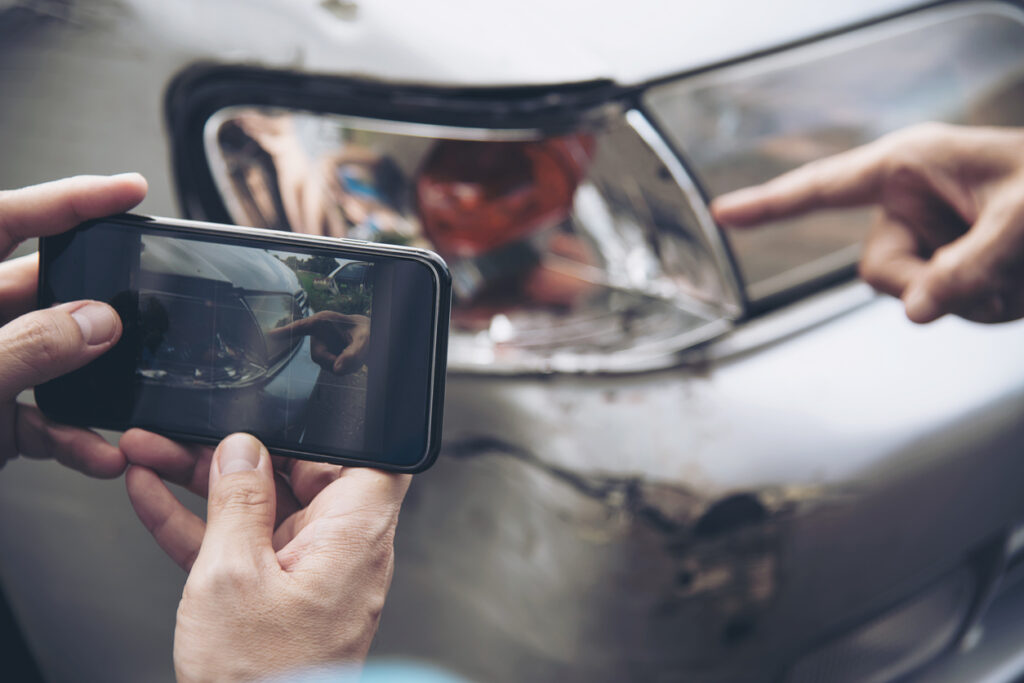 Documenting Uber Lyft accident car damage evidence Irvine